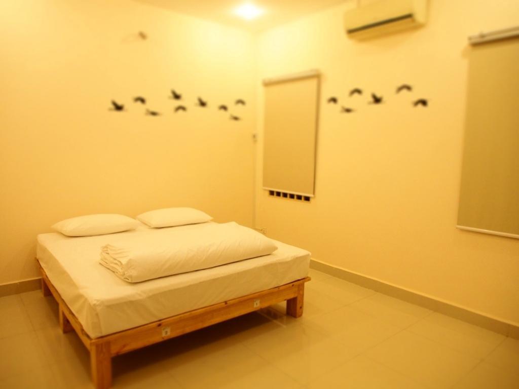 Top Hostel Phnom Penh Habitación foto