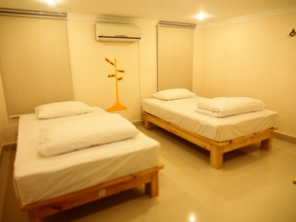 Top Hostel Phnom Penh Habitación foto